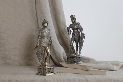 Lot 502 - A pair of silver and ivory-mounted figures