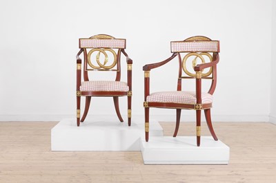 Lot 455 - A pair of neoclassical parcel-gilt and painted open armchairs