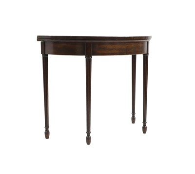 Lot 396 - A George III mahogany card table