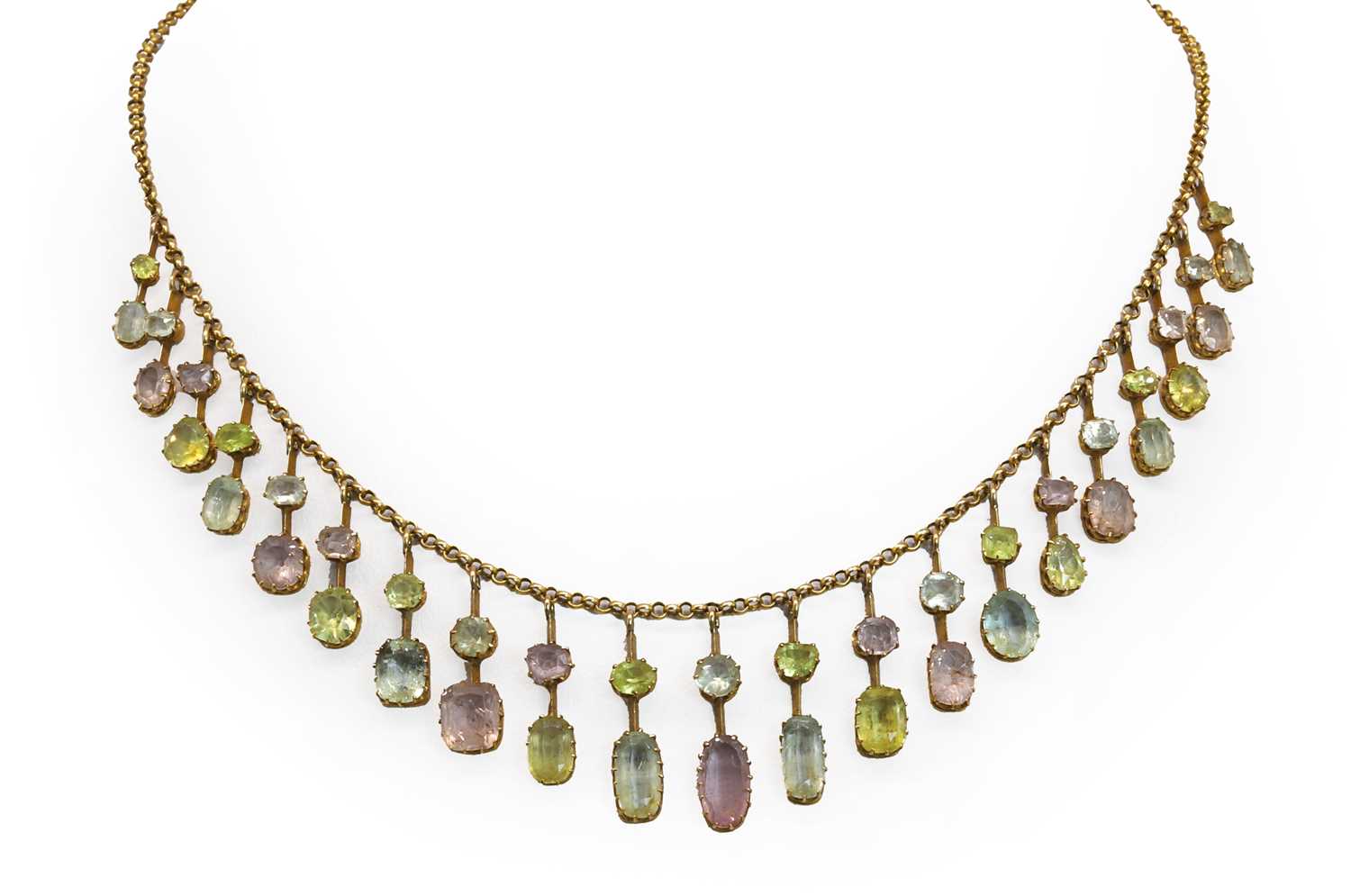 Lot 41 - An Edwardian pink topaz, aquamarine and chrysolite fringe necklace, c.1905