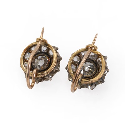 Lot 33 - A pair of  diamond daisy cluster earrings, c.1890