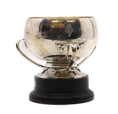 Lot 57 - An Arts and Crafts silver three-handled trophy