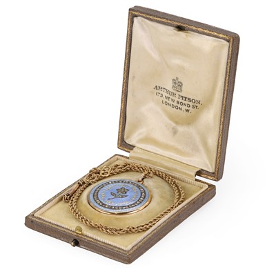 Lot 52 - An Edwardian guilloché enamel and rose cut diamond locket pendant and chain, c.1910