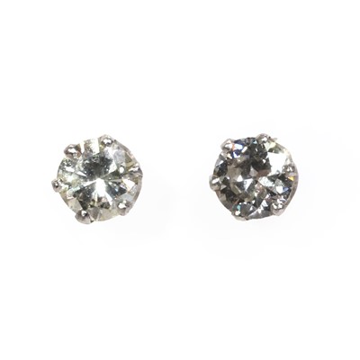 Lot 222 - A pair of diamond stud earrings