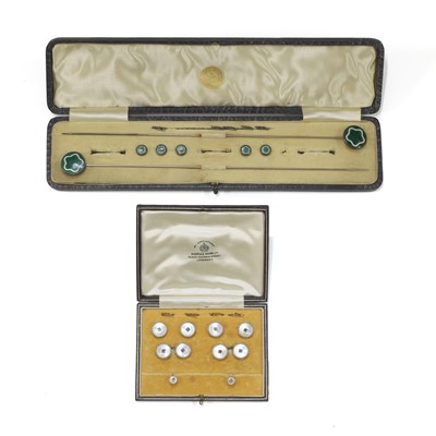 Lot 387 - A gold and platinum dress stud and cufflink set, by Mappin & Webb