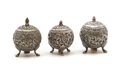 Lot 60 - A near pair of Indian silver pepperettes