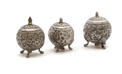 Lot 60 - A near pair of Indian silver pepperettes