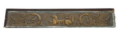 Lot 334 - An embossed brass overdoor