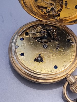 Lot 312 - An 18ct gold side wind half hunter pocket watch, by Langford
