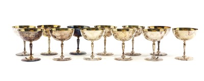 Lot 31 - A set of twelve silver champagne goblets