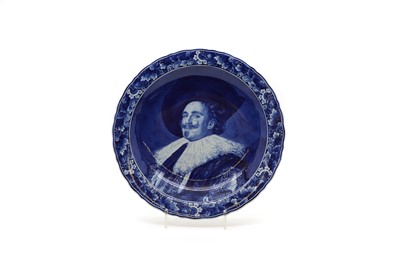 Lot 111 - A Delft pottery blue and white charger