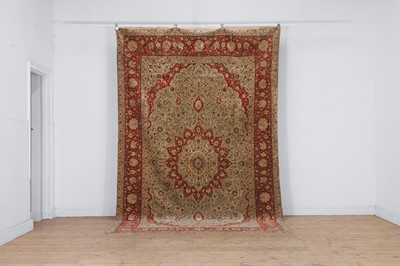 Lot 323 - A Hereke silk rug