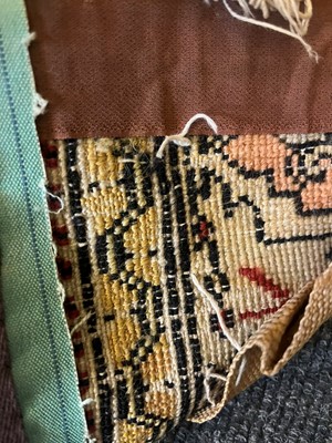 Lot 447 - A wool rug