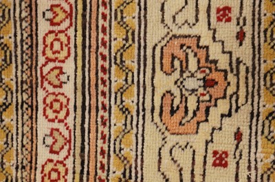 Lot 447 - A wool rug