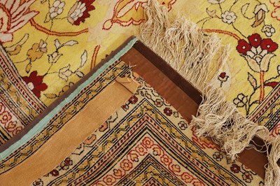 Lot 447 - A wool rug