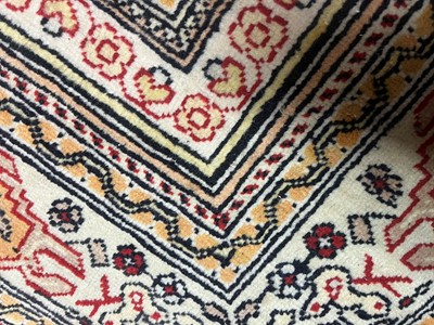 Lot 447 - A wool rug