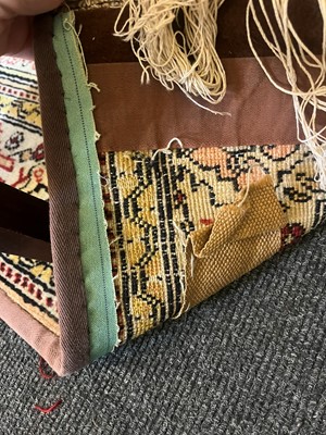 Lot 447 - A wool rug