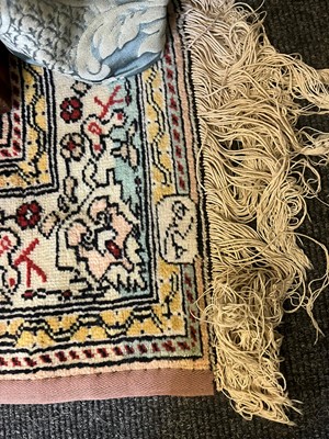 Lot 447 - A wool rug