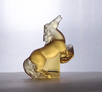 Lot 263 - A Lalique amber glass 'Kazak' horse