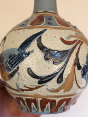 Lot 205 - A Brannam Pottery solifleur vase.