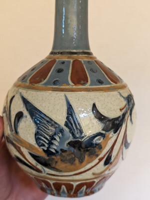 Lot 205 - A Brannam Pottery solifleur vase.