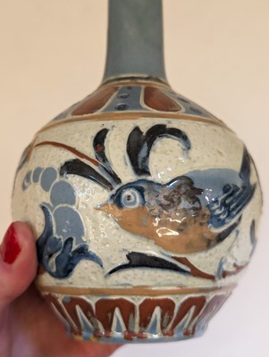 Lot 205 - A Brannam Pottery solifleur vase.