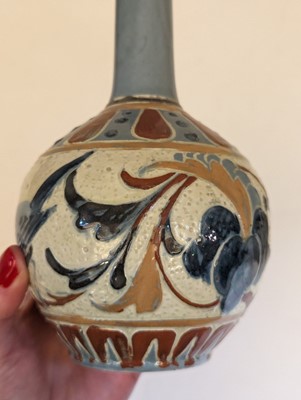 Lot 205 - A Brannam Pottery solifleur vase.