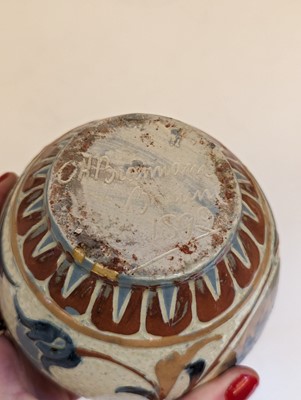 Lot 205 - A Brannam Pottery solifleur vase.