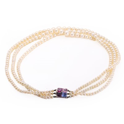 Lot 212 - A three row cultured pearl necklace