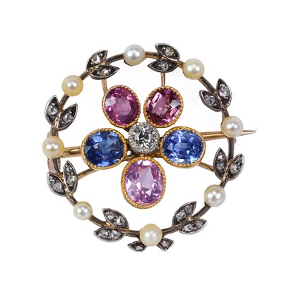 Lot 44 - A blue and pink sapphire, diamond and split pearl wreath brooch