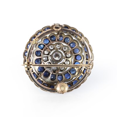 Lot 65 - A diamond and sapphire target brooch/pendant