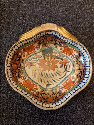 Lot 221 - A Minton pottery Imari tea service