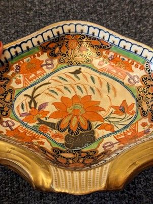 Lot 221 - A Minton pottery Imari tea service