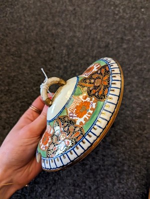 Lot 221 - A Minton pottery Imari tea service