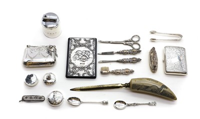 Lot 42 - A collection of silver novelty items