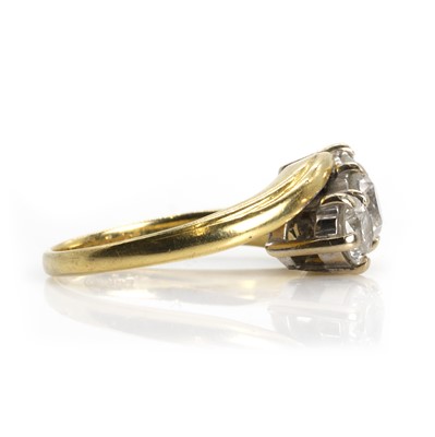 Lot 169 - An 18ct gold three stone diamond ring