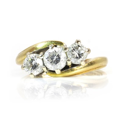 Lot 169 - An 18ct gold three stone diamond ring