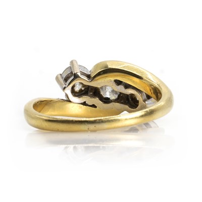 Lot 169 - An 18ct gold three stone diamond ring