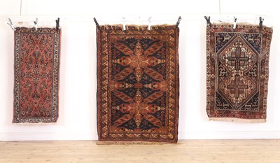 Lot 432 - A group of three rugs