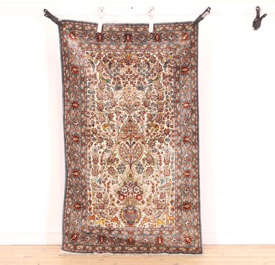 Lot 436 - A silk tree of life design rug