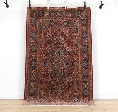 Lot 452 - A Kashan carpet