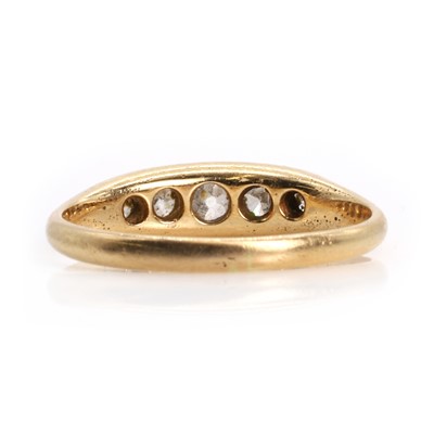 Lot 53 - A gold five stone diamond boat shaped ring