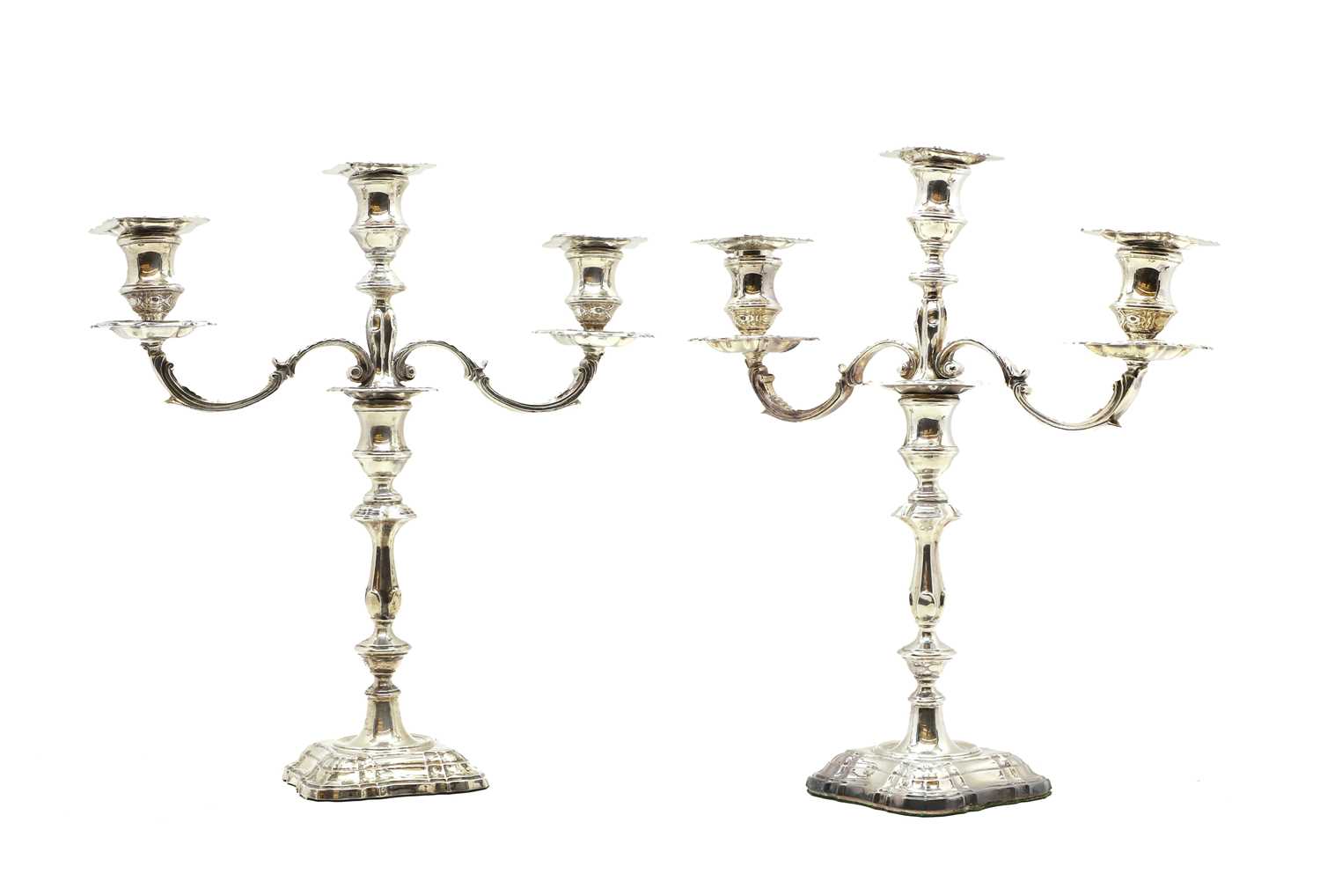 Lot 6 - A pair of silver three branch candelabra