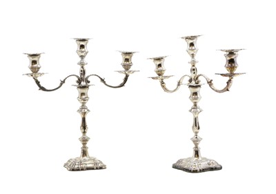 Lot 6 - A pair of silver three branch candelabra