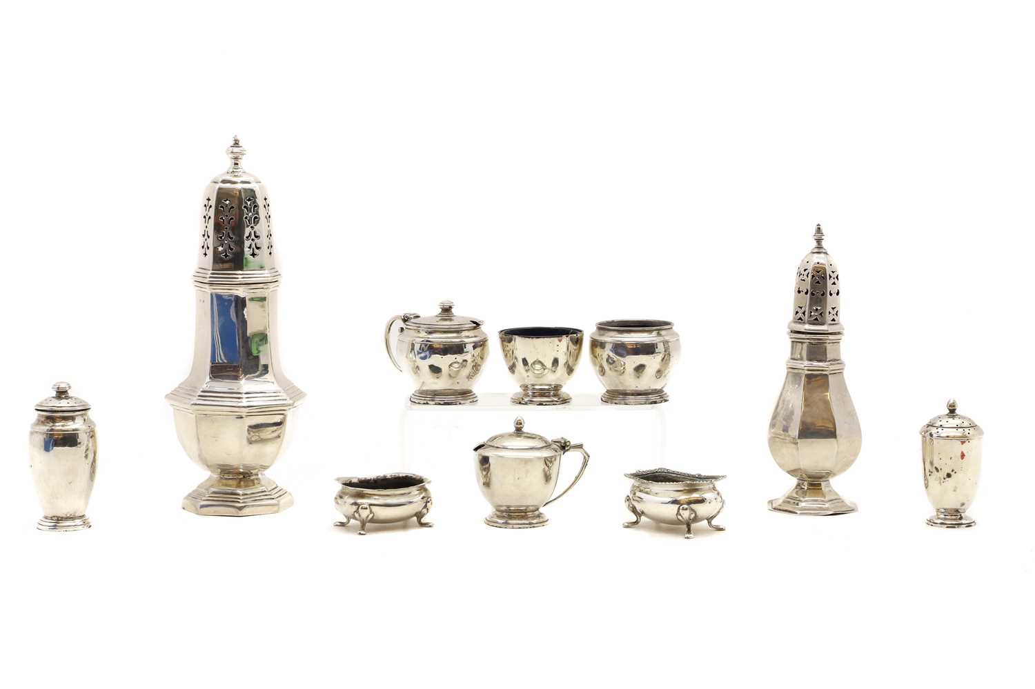 Lot 36 - A collection of silver cruet items