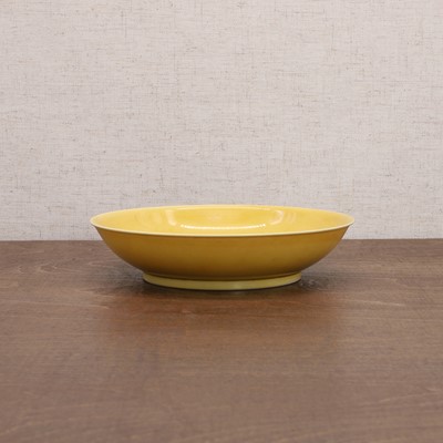 Lot 86 - A Chinese yellow-glazed dish