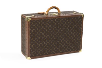 Lot 90 - A Louis Vuitton monogrammed canvas 'Alzer 65' suitcase