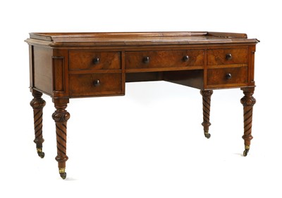 Lot 512 - An early Victorian burr walnut writing table