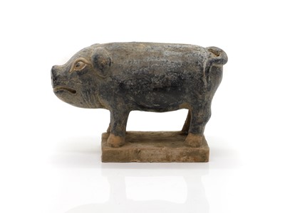 Lot 184 - A Ming-style pottery pig