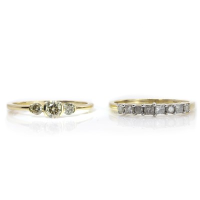 Lot 197 - One coloured diamond ring and a half eternity ring